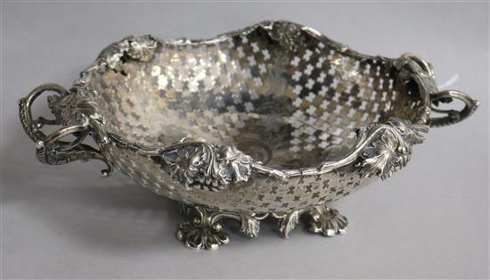 A mid 19th century Austrian pierced silver two handled fruit bowl, 12.5 oz.